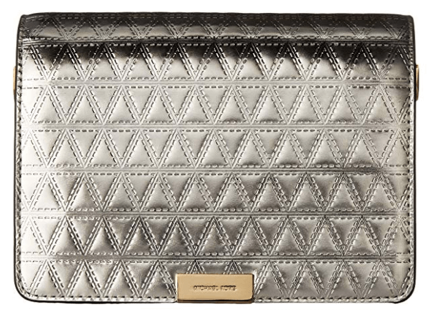 The Michael Kors Gusset Clutch in silver.