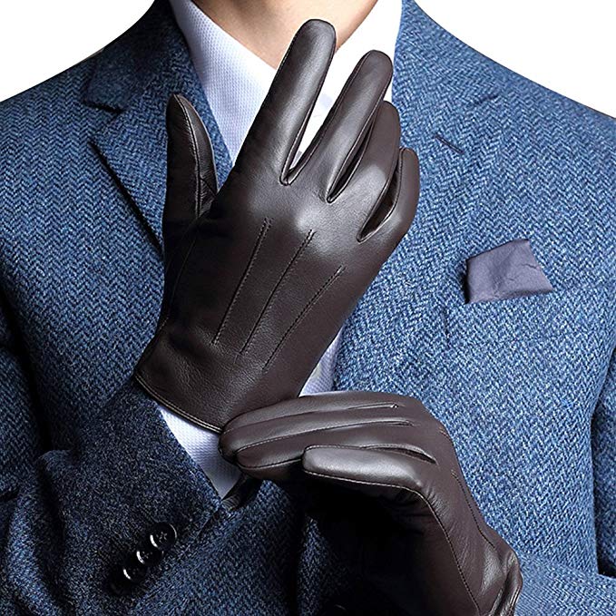 A man putting on nice leather driving gloves.