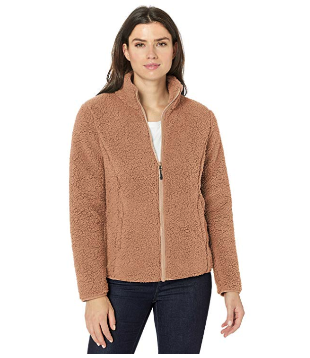 A woman wearing a fleece zipup.