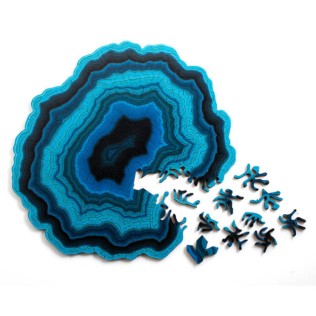 A puzzle that looks like a blue geode.