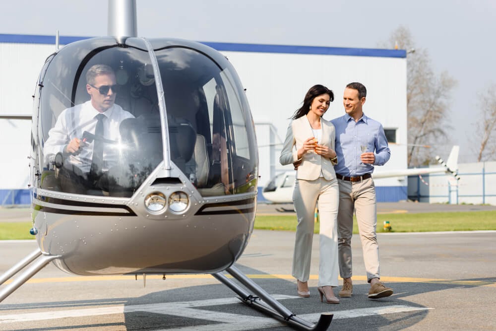 couple about to take helicopter