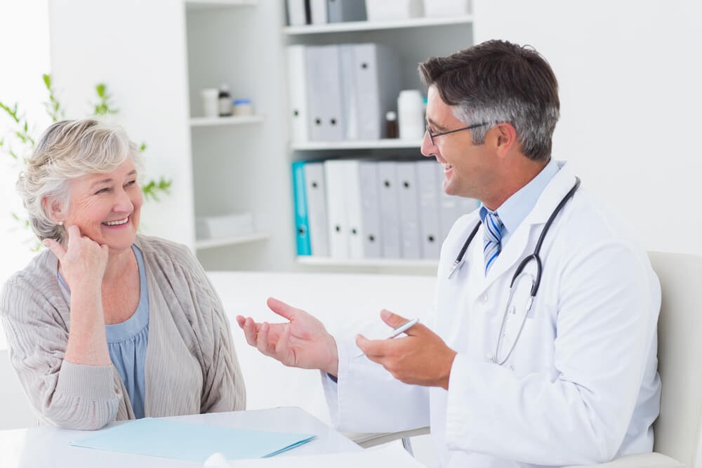 Women talking to doctor