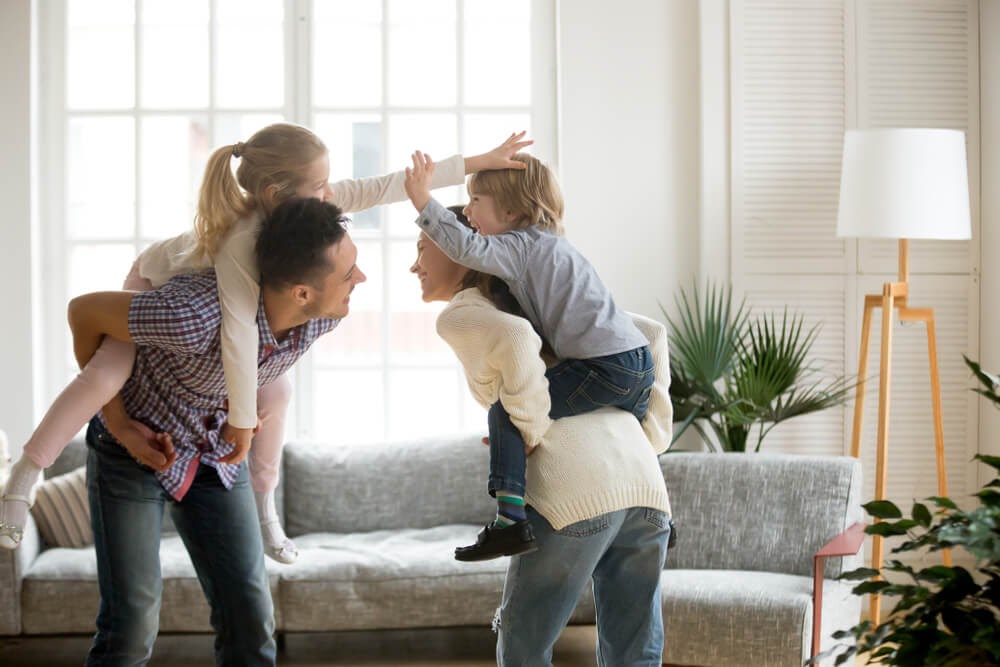 family playing in livingroom