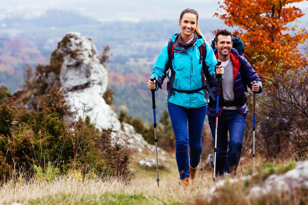 Two people hiking with backpacks