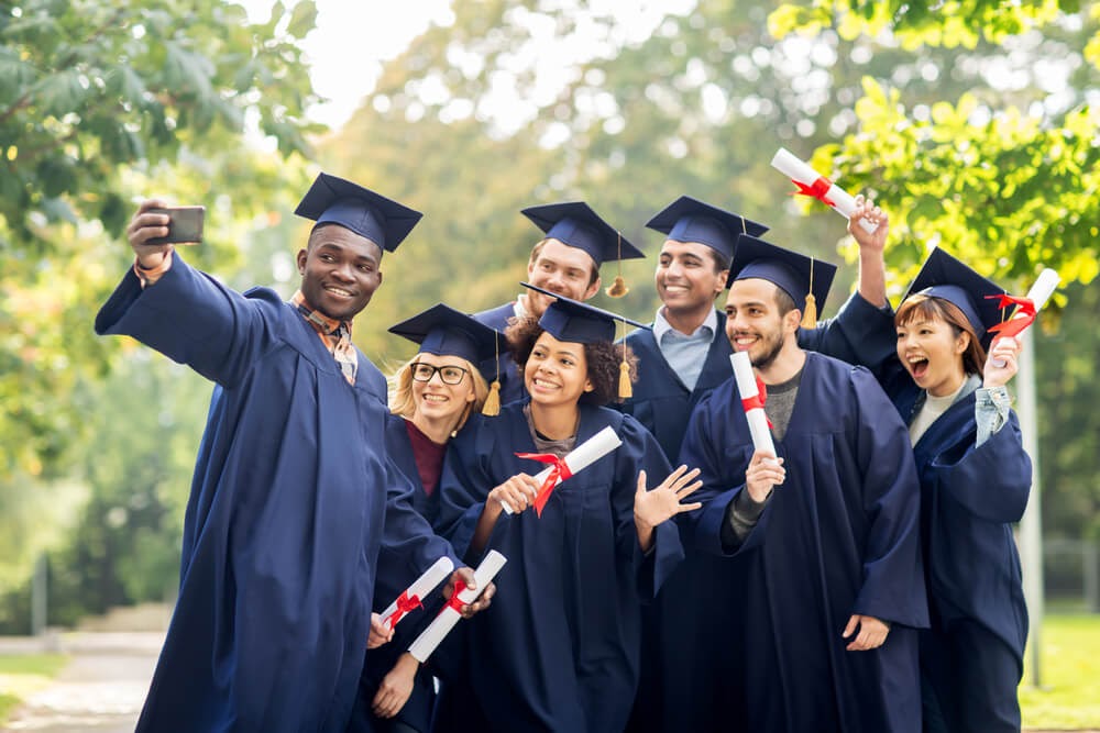 Group of graduates posing for selfie