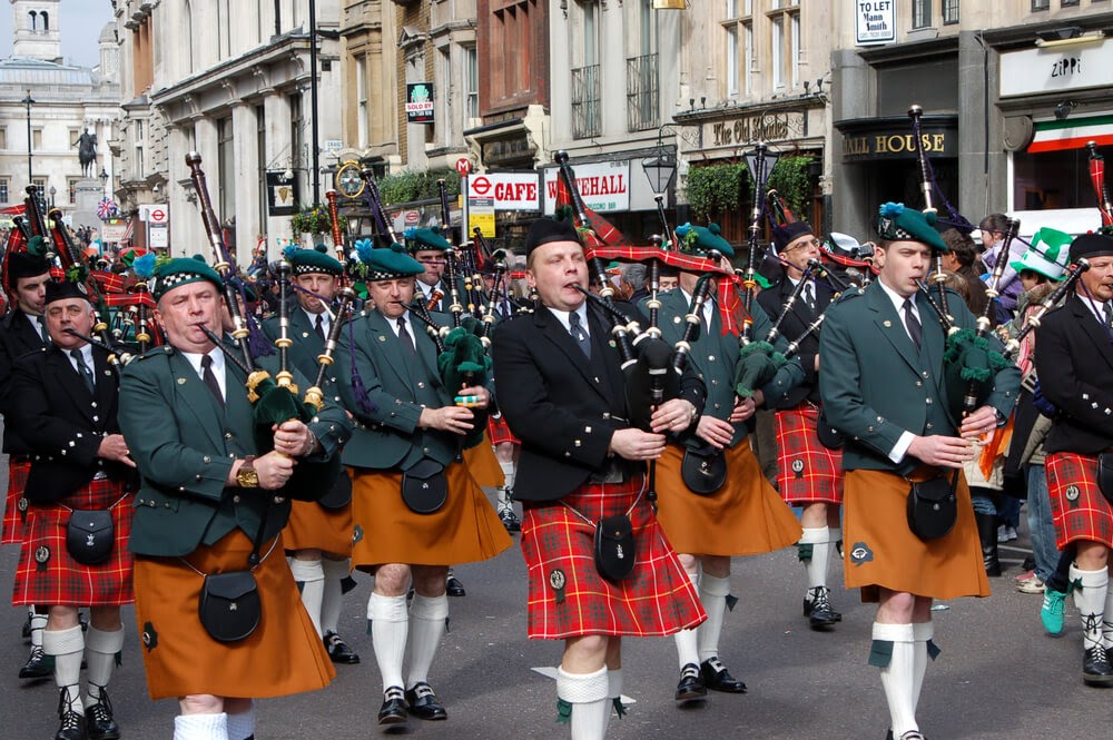 Men in kilts playing bagpipes