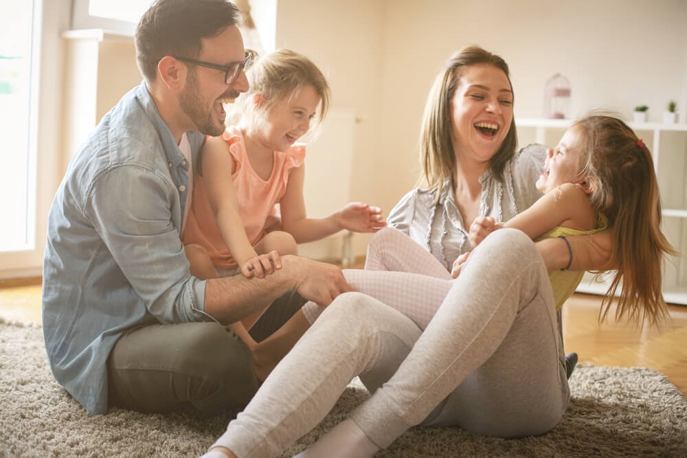 family laughing at home
