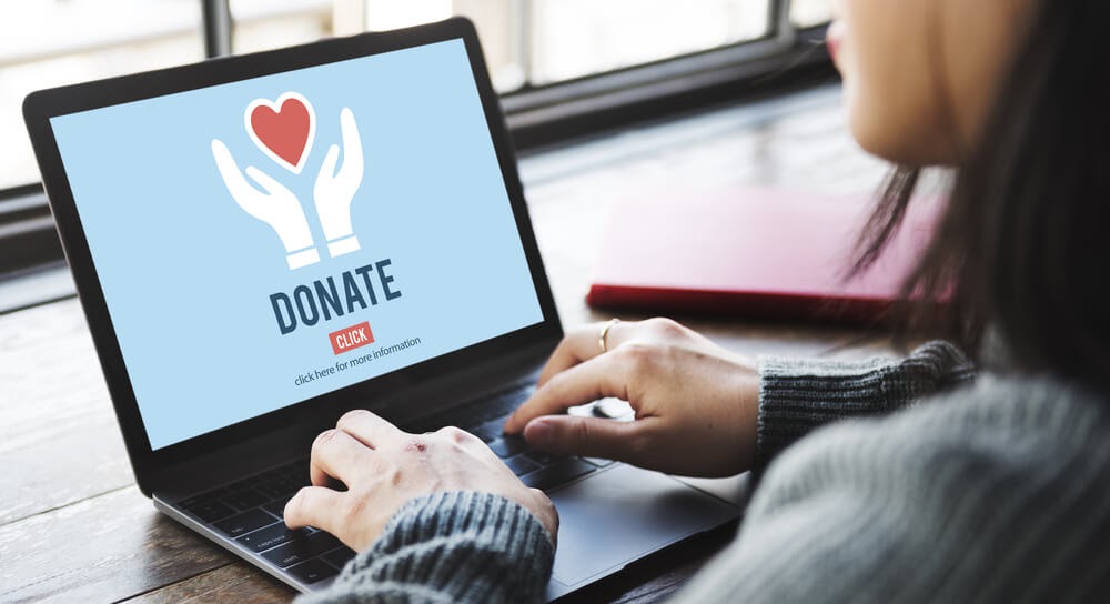 person donating on computer