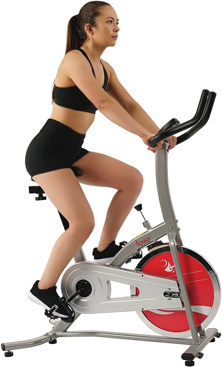 Woman on exercise bike.