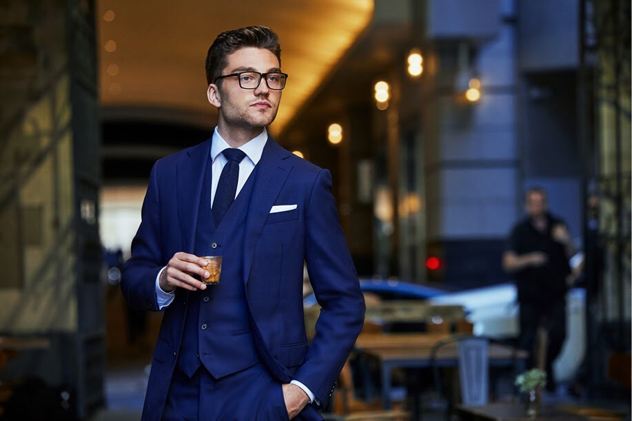 Institchu, man in a blue suit