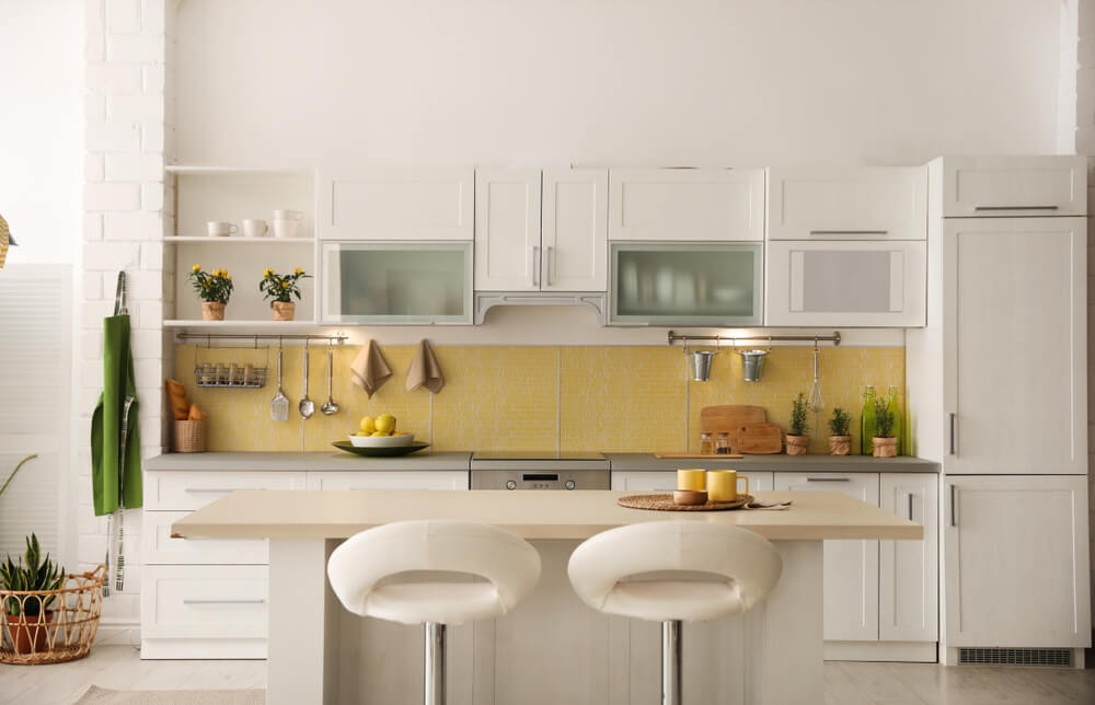 Modern white and yellow kitchen, very cheerful.