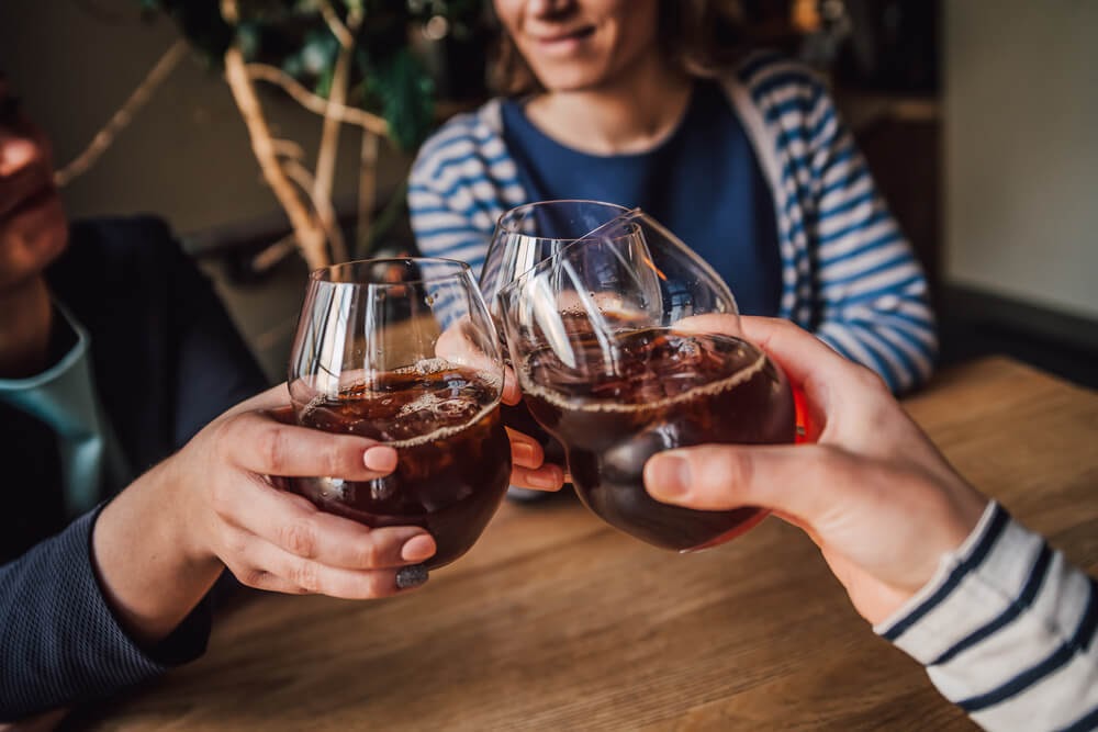 Group of people drinking cold brew.
