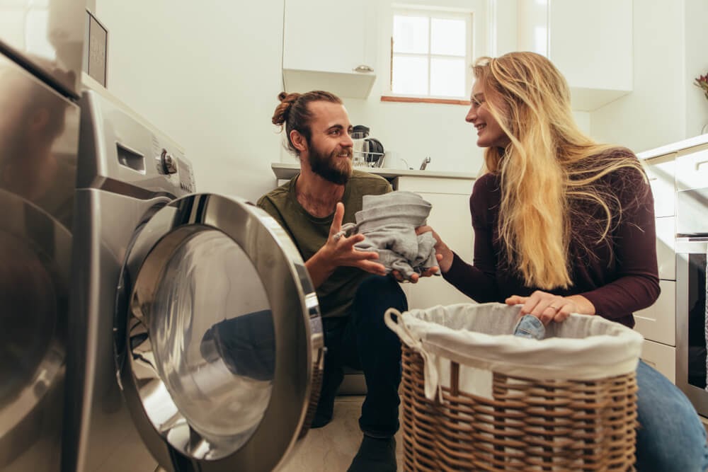 Man and woman doing laundry