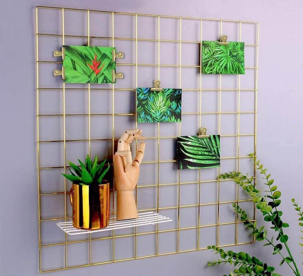 bulldog hinge clips holding up postcards