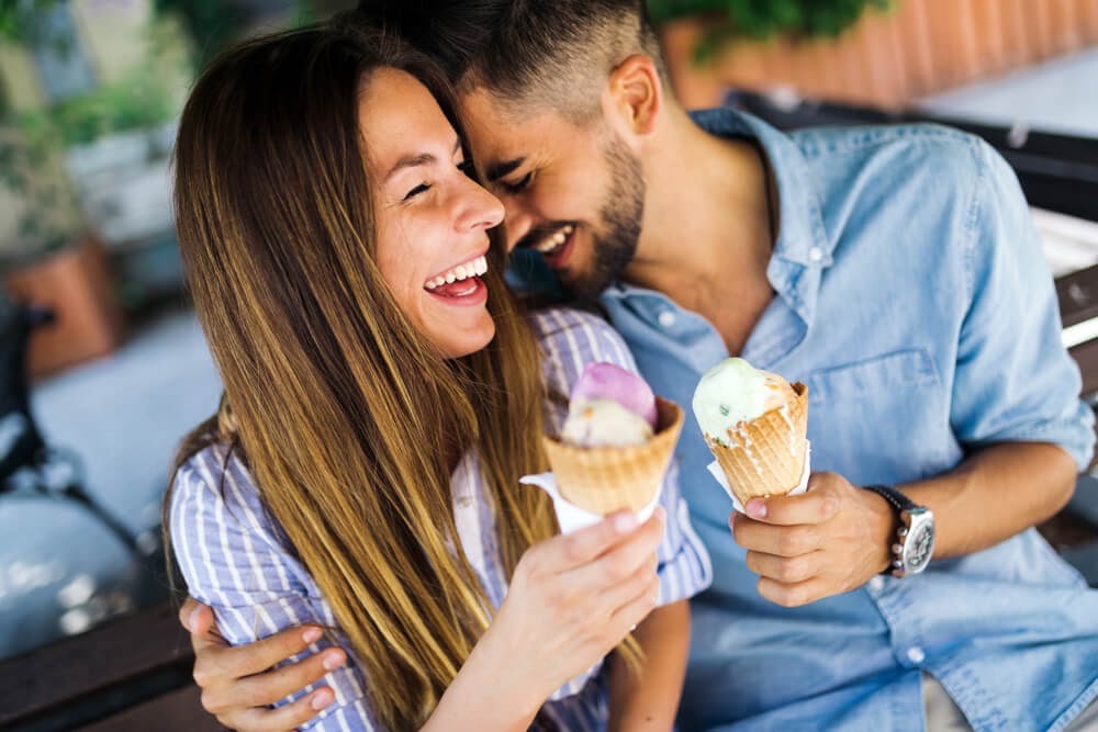 Man and woman eating ice cream