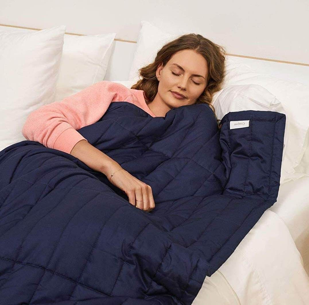 Woman sleeping peacefully with blanket