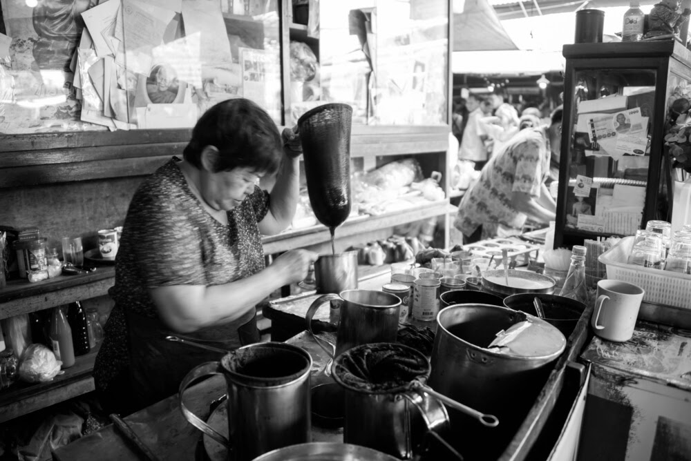 Woman making coffee