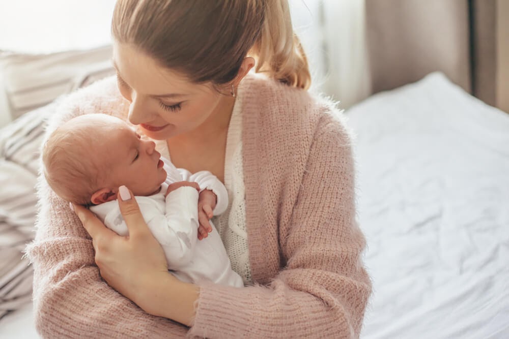 Woman holding her newborn