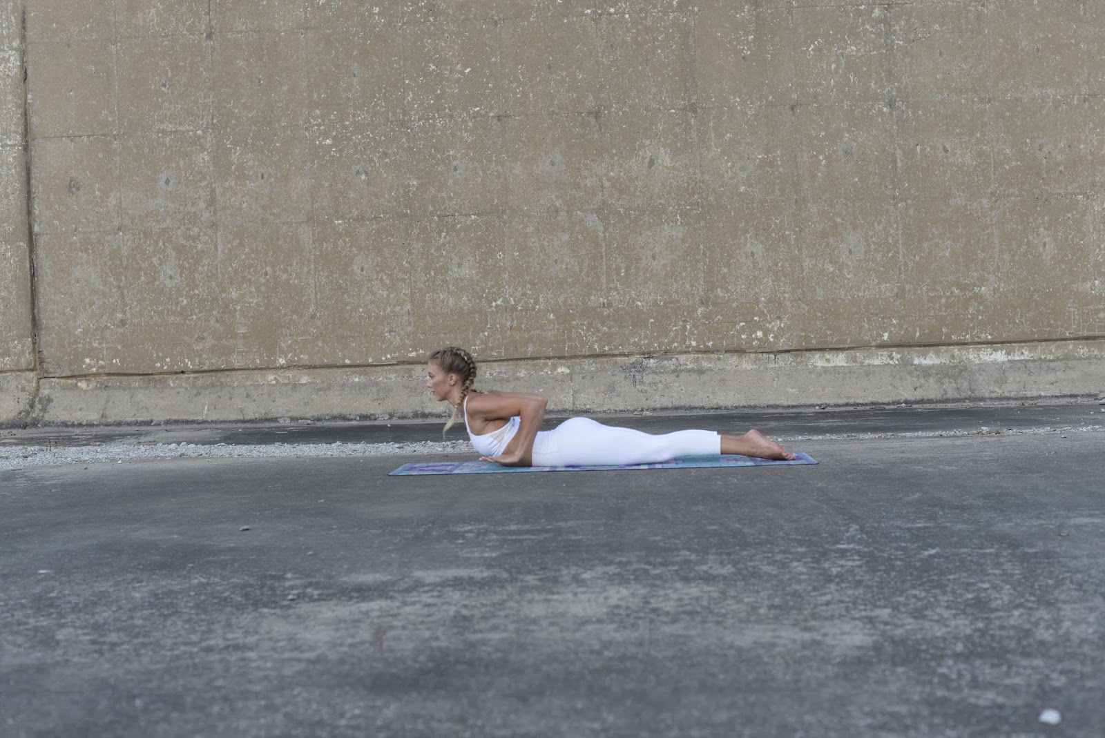 Woman doing low cobra