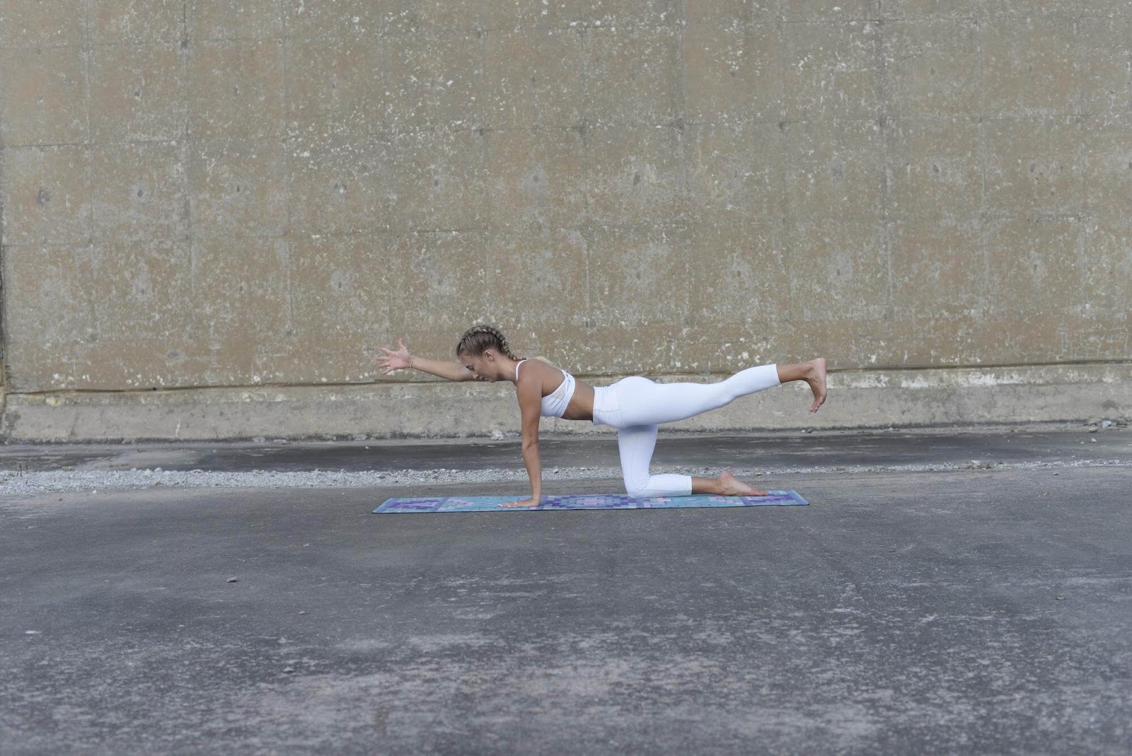 Woman in spinal balance pose