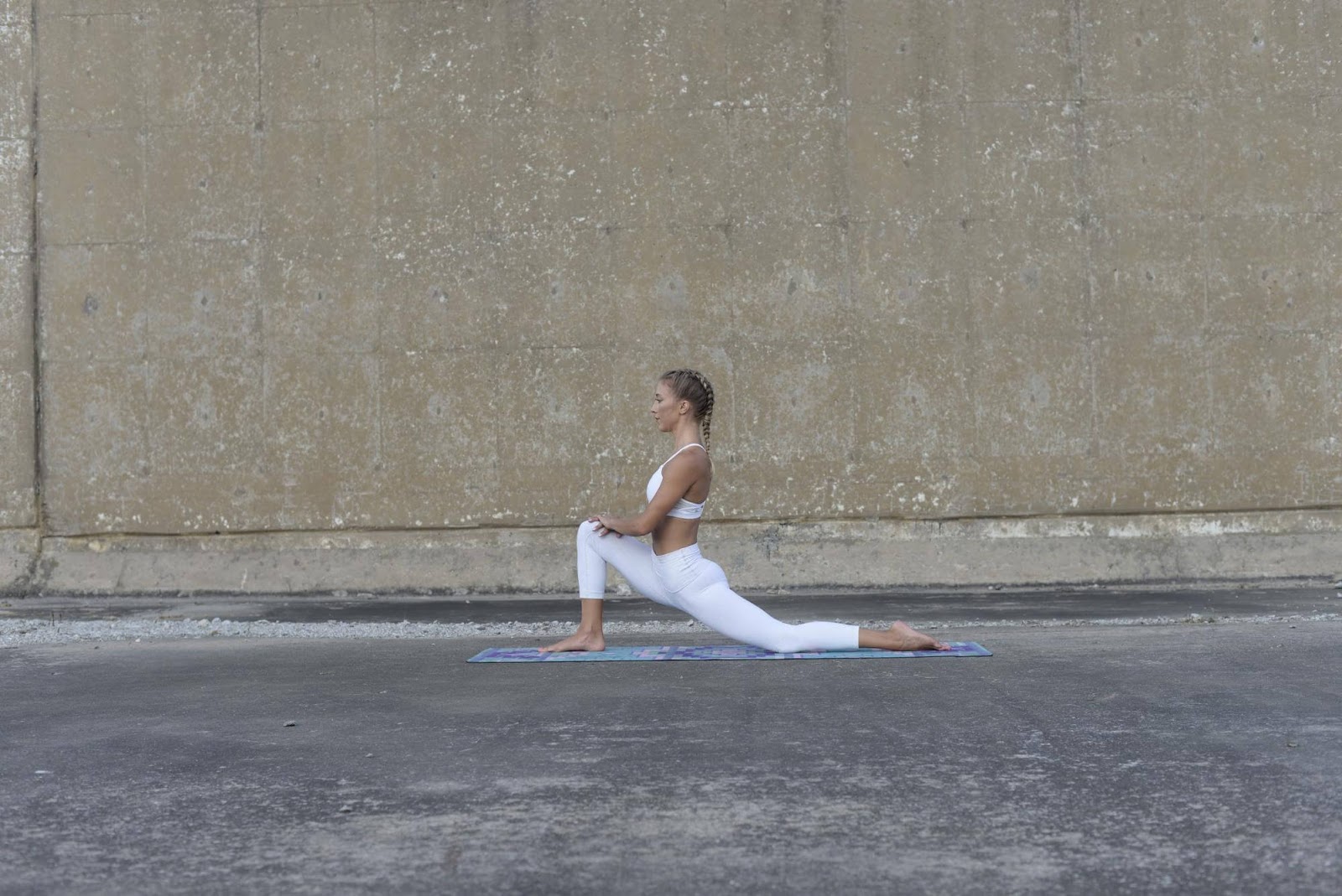Woman in half kneeling position