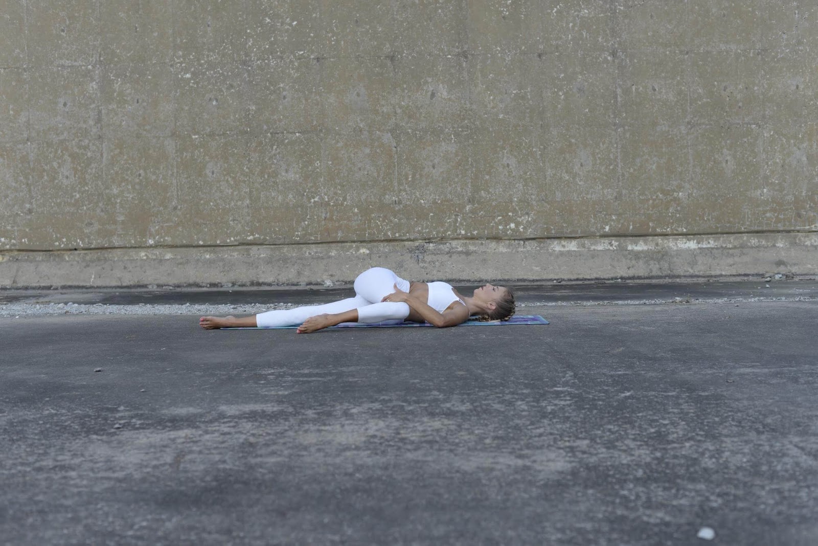 Woman in Spinal Twist position