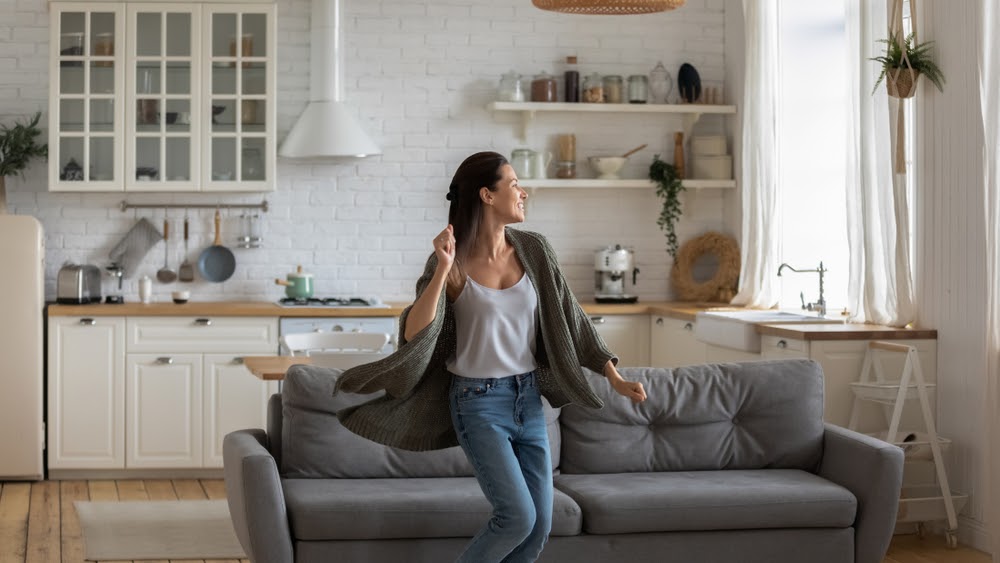 Woman dancing in the living room