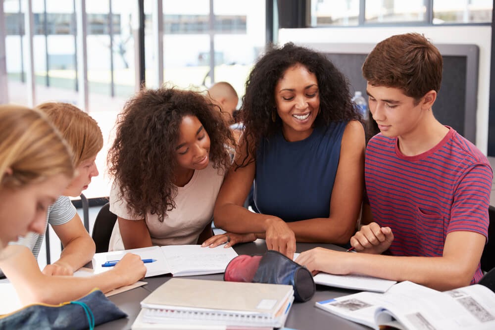 young professionals tutoring teens