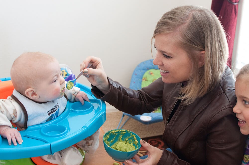 Mom feeding her baby