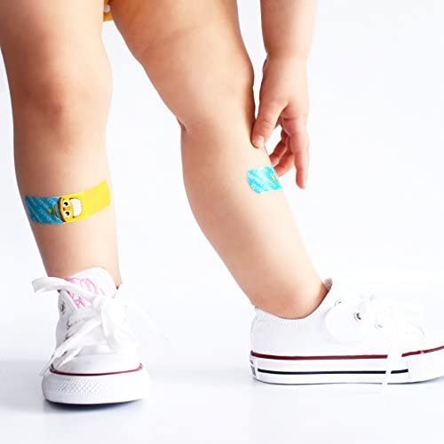 Kids legs with bandages
