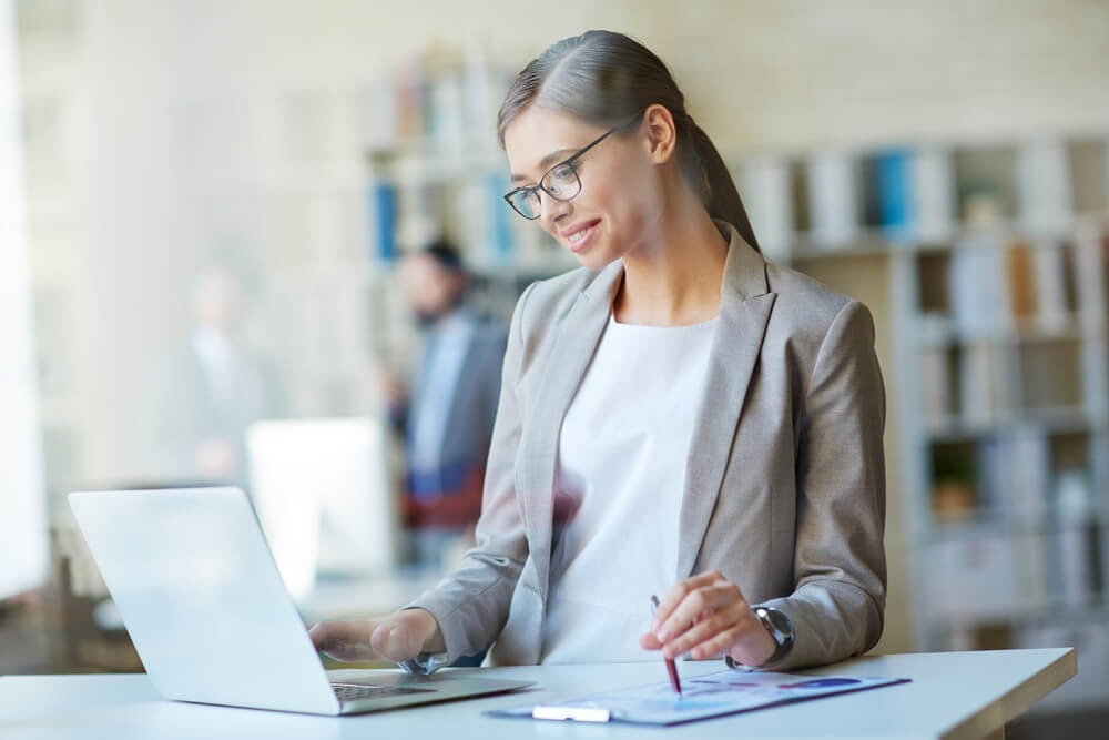 Woman working while standing