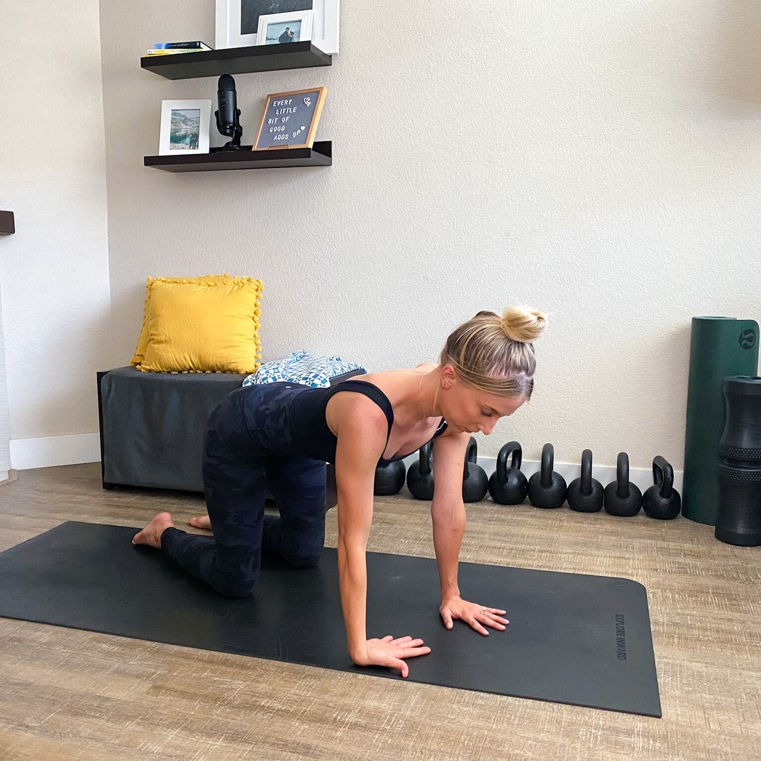 Emily on hands and knees, stretching her wrists