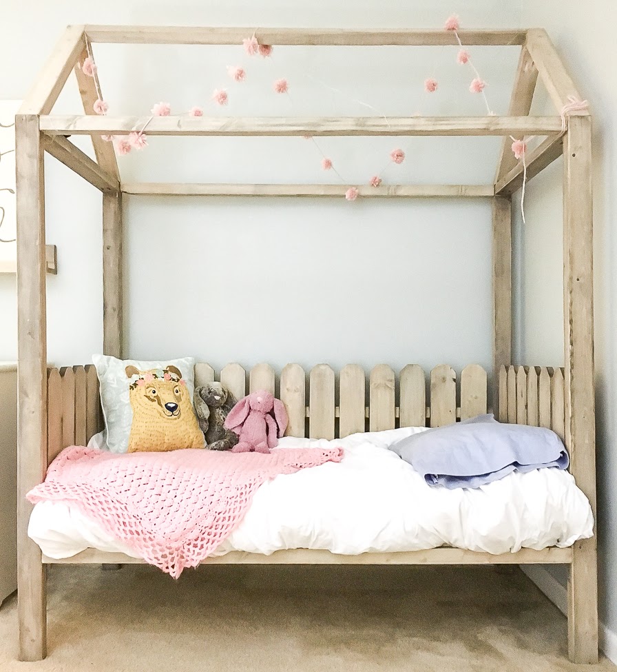 Toddler bed with wooden frame