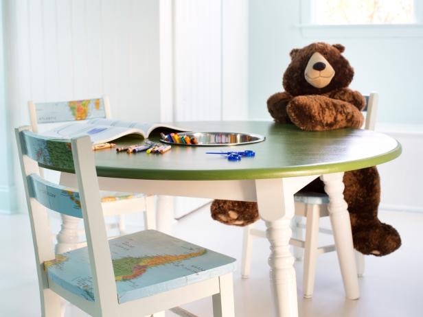 Child table with chairs covered in a world map