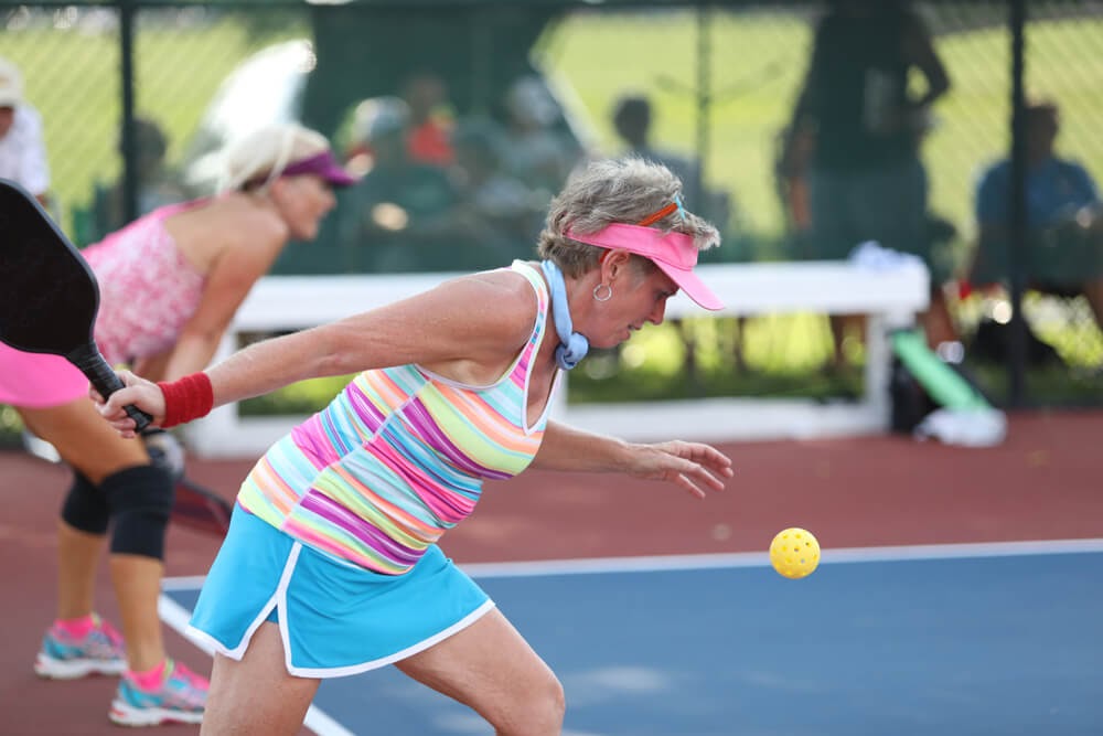 Woman playing pickleball