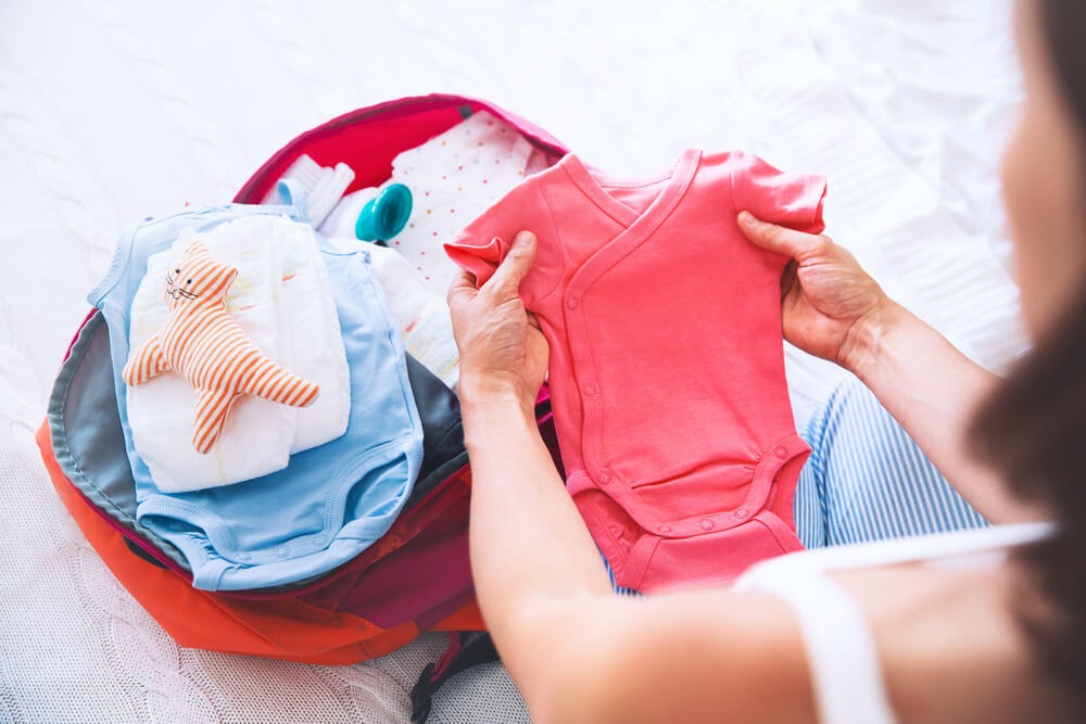 Woman packing her baby bag
