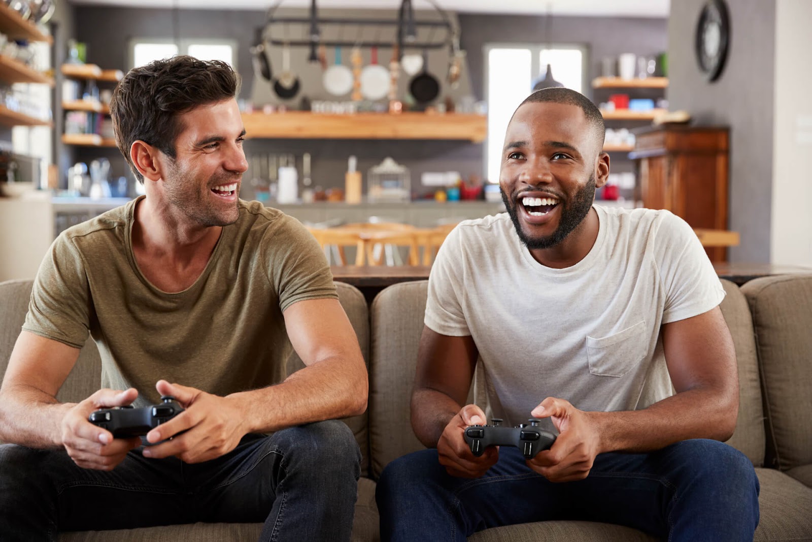 Two men playing video games together