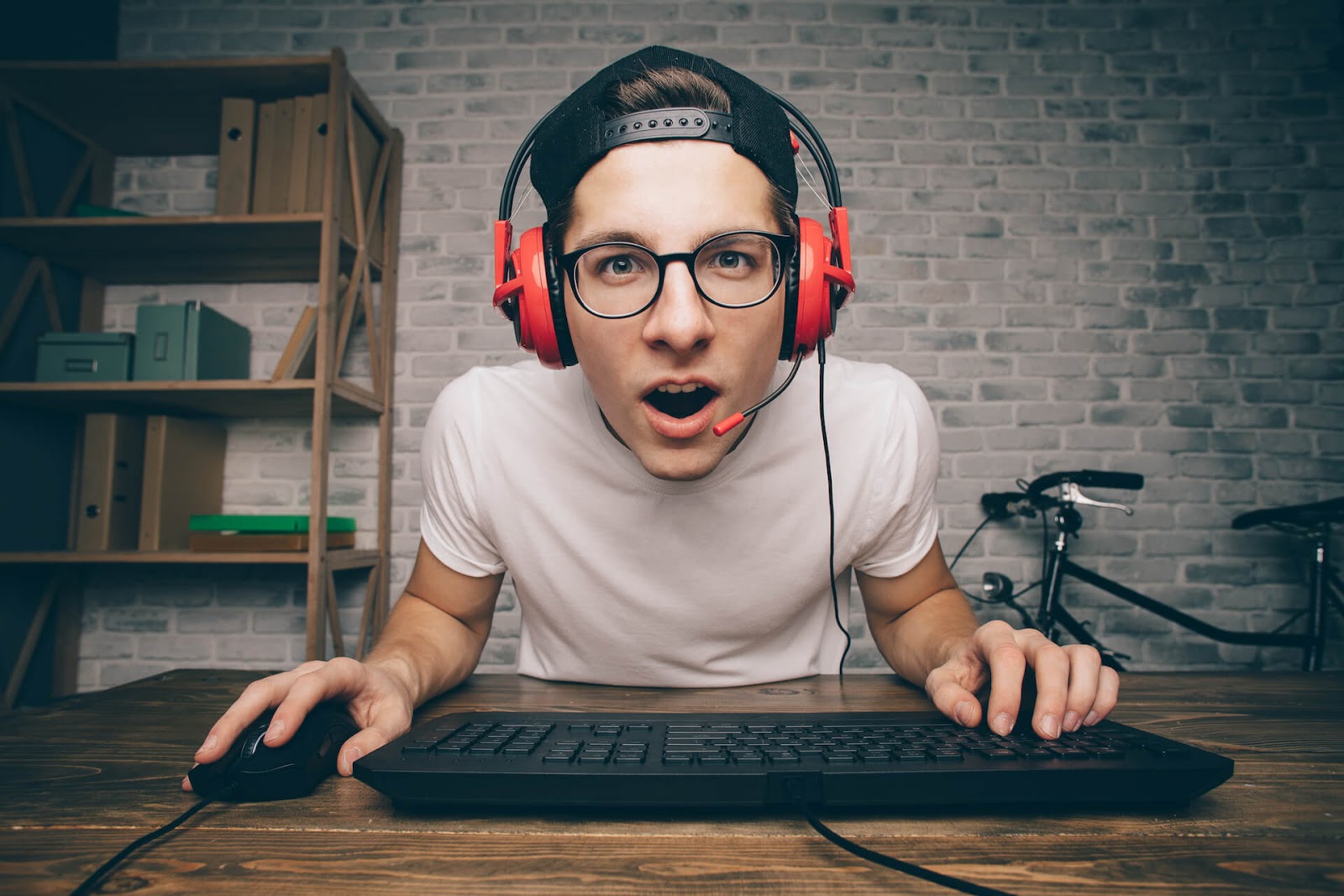 Man looking at his computer playing video games
