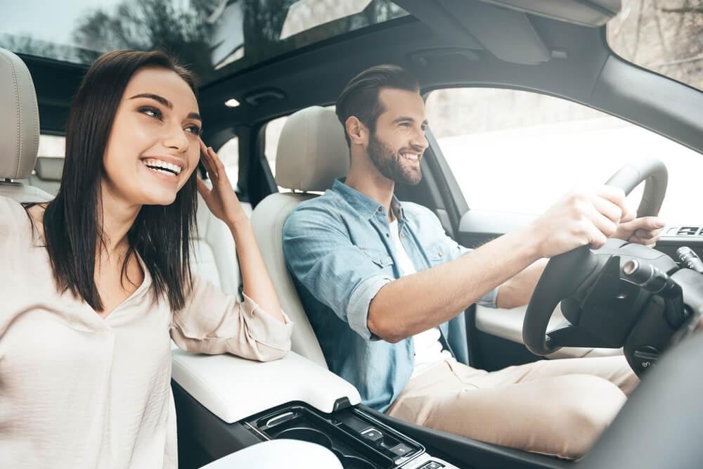 couple driving in a car