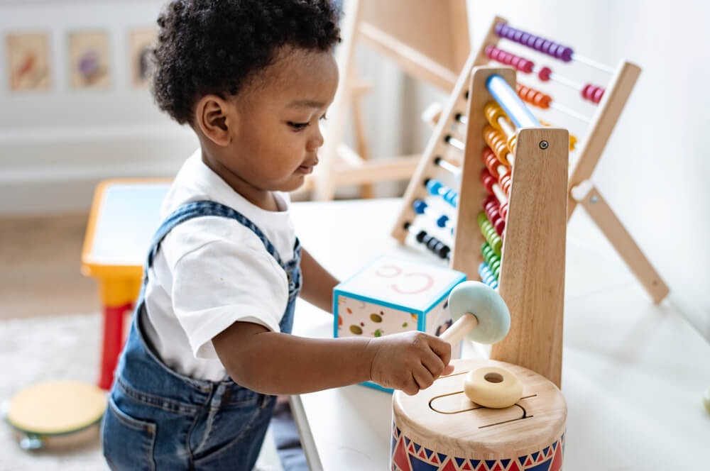 Baby playing with toys