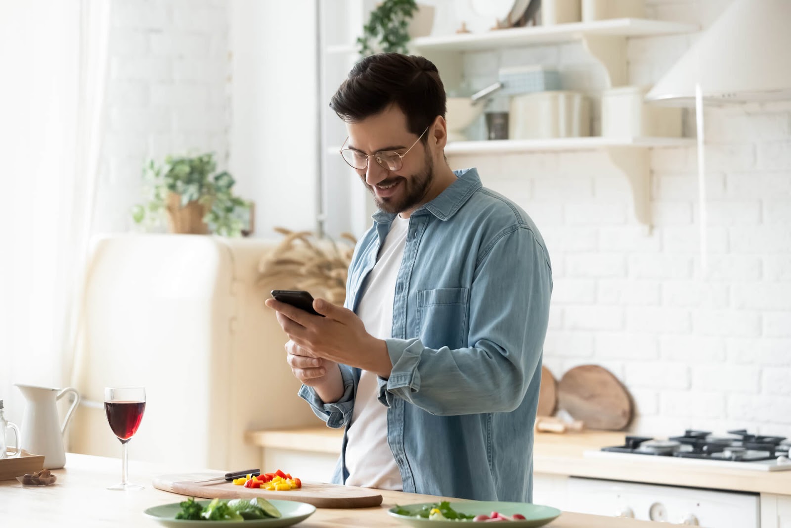 Man shopping for wine on his phone