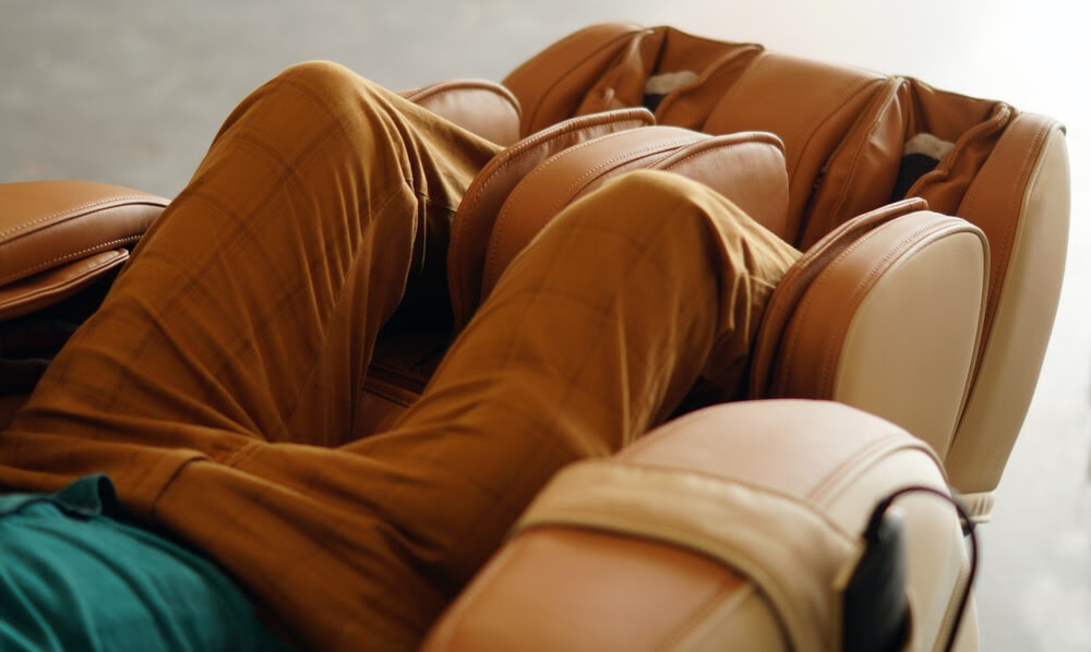 Man sitting in massage chair
