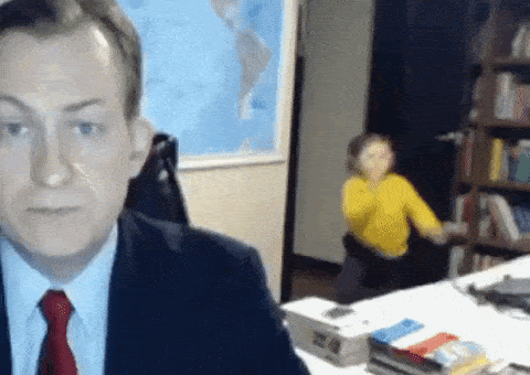 Business man's meeting getting interrupted by daughter