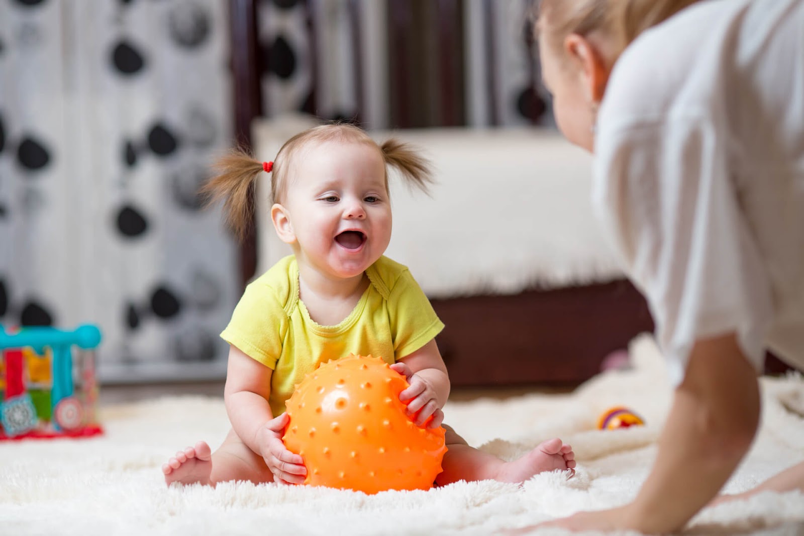 Adult and Child Playing "Ball Toss"