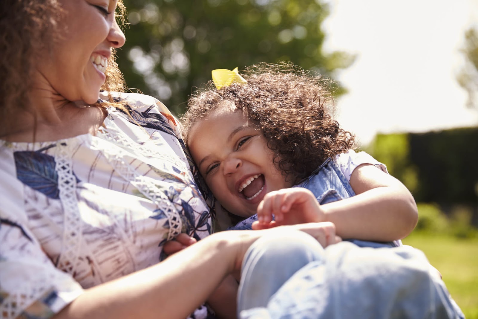 Mom and daughter laughing