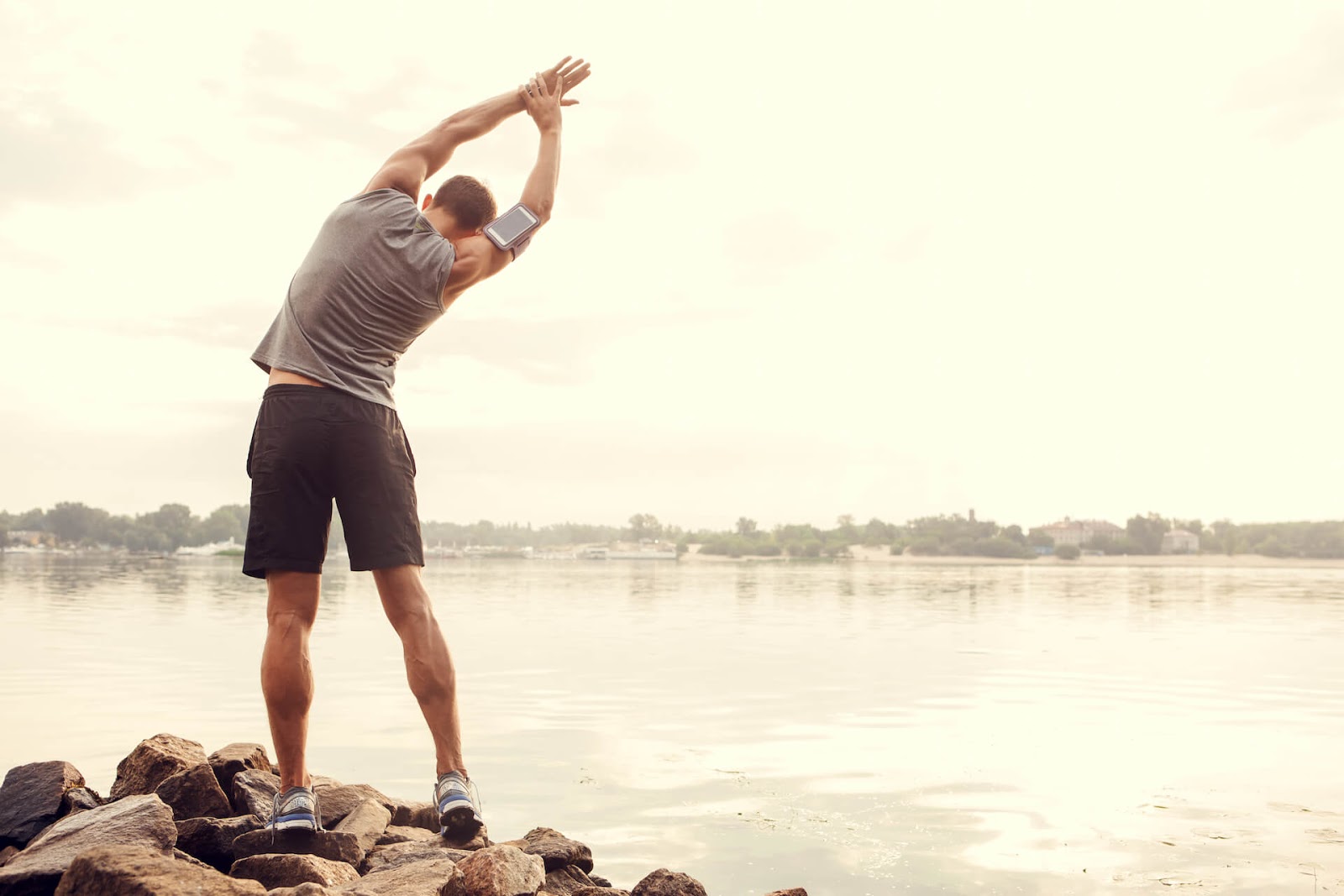 Man stretching outside