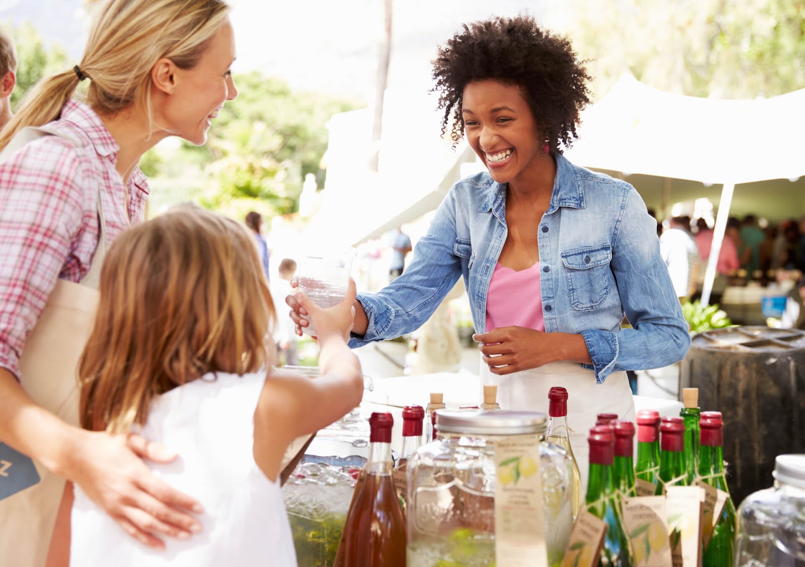 Ladies enjoying themselves and talking at a farmer's market
