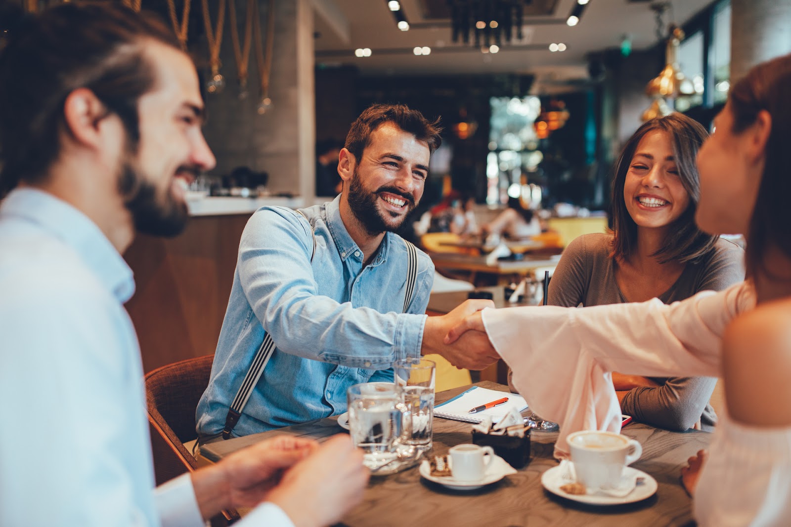Introductions around a table at a restaurant