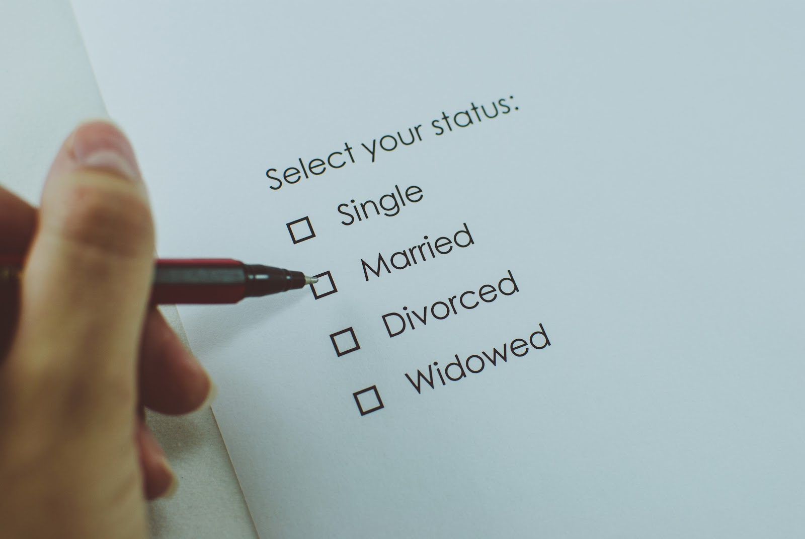 Woman checking her current relationship box