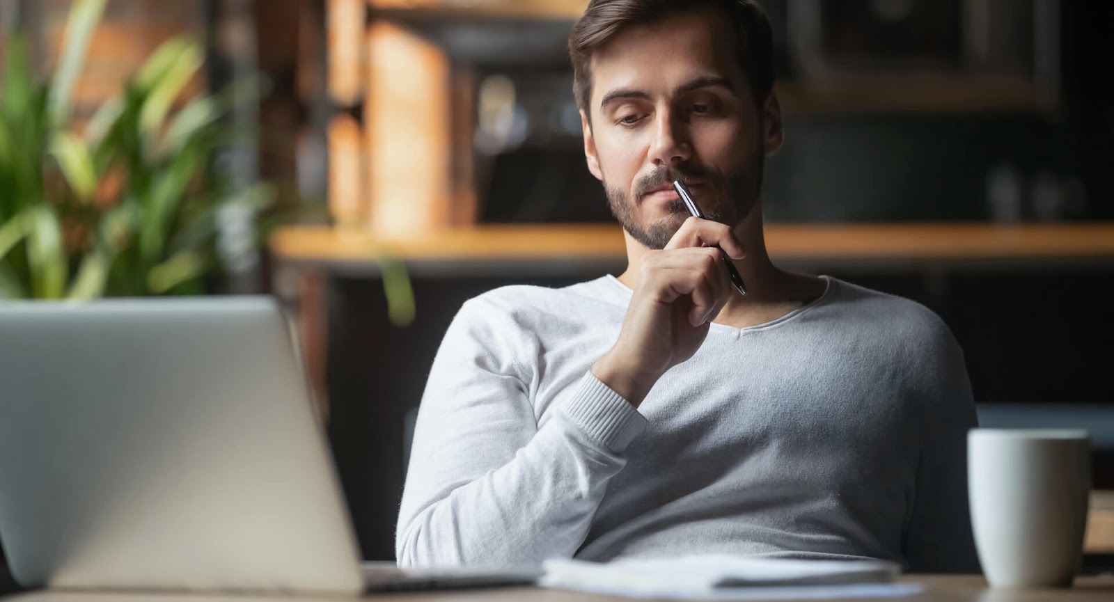 Man thinking at his desk